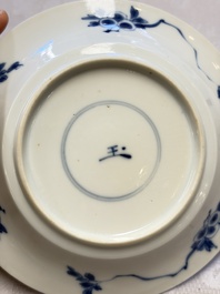 A Chinese blue and white 'Hunting Scene' cup and saucer, Kangxi