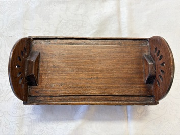 A pair of Chinese sancai-glazed 'Horseriders' roof tiles on wooden stands, Ming