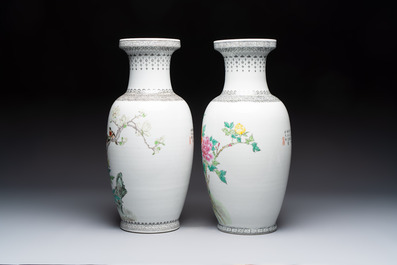 A Chinese famille rose 'Mountainous Landscape' jardiniere with a stand and a pair of vases with floral design, Qianlong marks, 20th C.