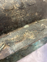A rare and large Chinese archaistic bronze pouring vessel and cover, Gong 觥, Qing