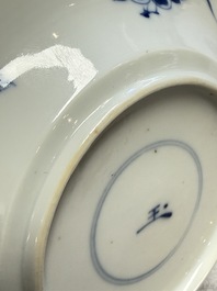 A Chinese blue and white 'Hunting Scene' cup and saucer, Kangxi