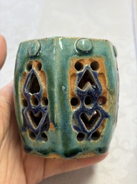 A pair of Chinese turquoise-glazed Buddhist lions, a pair of green-glazed parrots and a pair of miniature garden seats, 19/20th C.