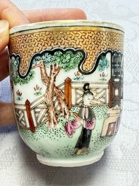 A fine Chinese Canton famille rose cup and saucer with figural design, Yongzheng/Qianlong