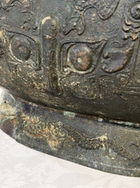 A rare and large Chinese archaistic bronze pouring vessel and cover, Gong 觥, Qing