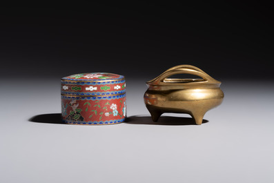 A group of eleven Chinese decorative objects, including bronze, cloisonn&eacute;, wood, and silk, 20th C.