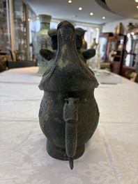A rare and large Chinese archaistic bronze pouring vessel and cover, Gong 觥, Qing