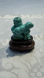 A complete set of 12 Chinese carved turquoise 'Children at Play with the Zodiac Animals' figures on wooden stands, Republic