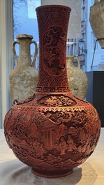 A pair of Chinese cinnabar lacquer 'Xi Xiang Ji' 'Tianqiu Ping' vases, 20th C.