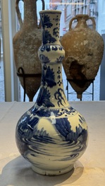 A rare Chinese blue and white bottle vase with narrative design, Transitional period