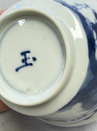 A Chinese blue and white 'Hunting Scene' cup and saucer, Kangxi