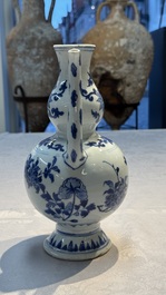 A Chinese blue and white 'Floral' ewer, Transitional period