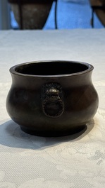 A Chinese bronze censer with lion-head handles and relief dragon design, Lu Gu Zhai 侶古齋 mark, 18/19th C.