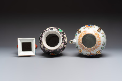 Five Chinese famille rose and verte vases and an armorial ewer, various marks, 20th C.