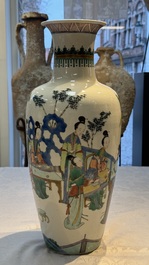 A Chinese famille verte 'Court Ladies' vase, 19th C.