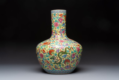 A Chinese famille rose yellow-ground 'Tianqiu Ping' vase with dragons and flowers, 20th C.