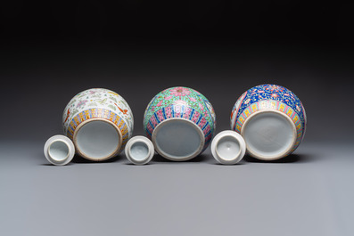A Chinese famille rose archaistic covered vase, a vase, and three covered ginger jars, Qianlong marks, 20th C.