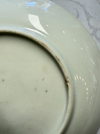 A fine Chinese Canton famille rose cup and saucer with figural design, Yongzheng/Qianlong