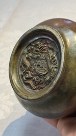 A Chinese bronze censer with lion-head handles and relief dragon design, Lu Gu Zhai 侶古齋 mark, 18/19th C.