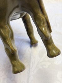 A Chinese teadust-glazed model of a horse on a wooden stand, Republic