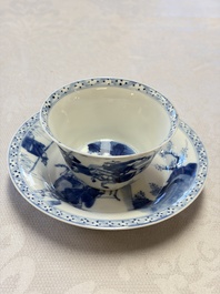A Chinese blue and white 'Hunting Scene' cup and saucer, Kangxi