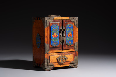 A group of eleven Chinese decorative objects, including bronze, cloisonn&eacute;, wood, and silk, 20th C.