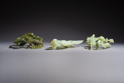 Five Chinese hardstone carvings, four with wooden stands, 20th C.