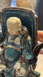 A Chinese fahua-glazed biscuit figure of Zhenwu, Ming