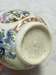 A fine Chinese Canton famille rose cup and saucer with figural design, Yongzheng/Qianlong
