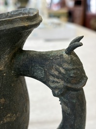 A rare and large Chinese archaistic bronze pouring vessel and cover, Gong 觥, Qing