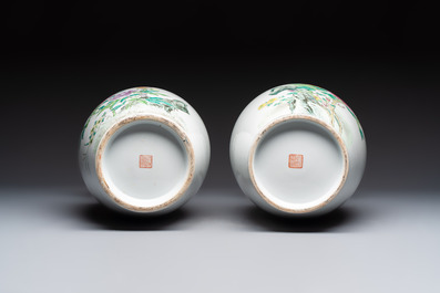A Chinese famille rose 'Mountainous Landscape' jardiniere with a stand and a pair of vases with floral design, Qianlong marks, 20th C.