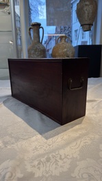 A Chinese white-jade-inset hongmu ruyi with a wooden presentation box and display case, 19th C.