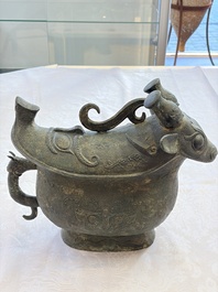 A rare and large Chinese archaistic bronze pouring vessel and cover, Gong 觥, Qing