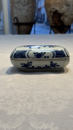A Chinese blue and white betel nut box and cover with floral design, Wanli