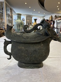 A rare and large Chinese archaistic bronze pouring vessel and cover, Gong 觥, Qing