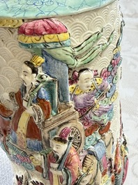 A pair of Chinese famille rose relief-moulded 'Immortals' vases, Qianlong mark, Republic