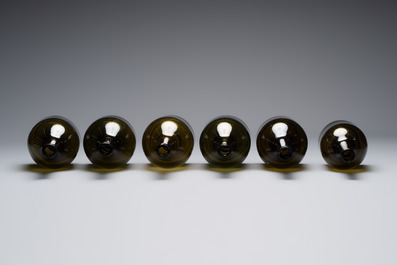 A set of six dark green glass mallet-shaped bottles, possibly France or England, 19th C. or earlier