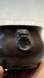 A Chinese bronze censer with lion-head handles and relief dragon design, Lu Gu Zhai 侶古齋 mark, 18/19th C.