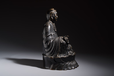 A Chinese bronze Bodhisattva seated on a lotus throne, 20th C.
