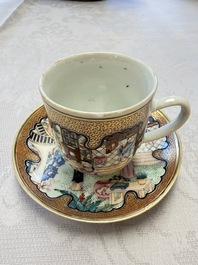 A fine Chinese Canton famille rose cup and saucer with figural design, Yongzheng/Qianlong