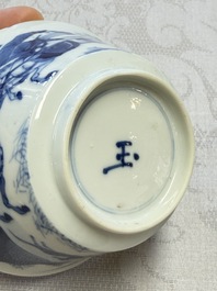 A Chinese blue and white 'Hunting Scene' cup and saucer, Kangxi