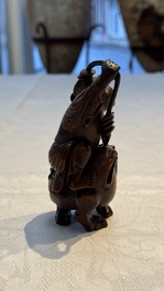 A small Chinese carved bamboo group of 'Liuhai', 19th C.