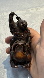 A small Chinese carved bamboo group of 'Liuhai', 19th C.
