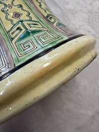 A Chinese verte biscuit 'Dragon Gate Carp 鯉躍龍門' vase on a wooden stand, Xuande mark, 19th C.