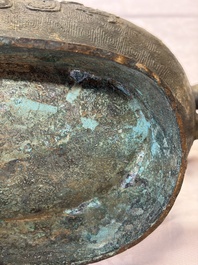 A rare and large Chinese archaistic bronze pouring vessel and cover, Gong 觥, Qing