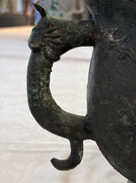 A rare and large Chinese archaistic bronze pouring vessel and cover, Gong 觥, Qing