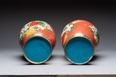 Three Chinese cloisonn&eacute; vases and a covered box, 20th C.