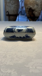 A Chinese blue and white betel nut box and cover with floral design, Wanli