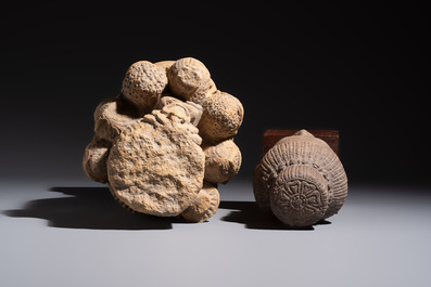 A Khmer-style carved stone head and a carved stone head of a deity, Thailand and Cambodia, 20th C. or earlier