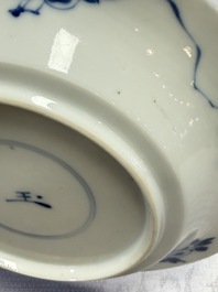 A Chinese blue and white 'Hunting Scene' cup and saucer, Kangxi