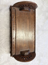 A pair of Chinese sancai-glazed 'Horseriders' roof tiles on wooden stands, Ming